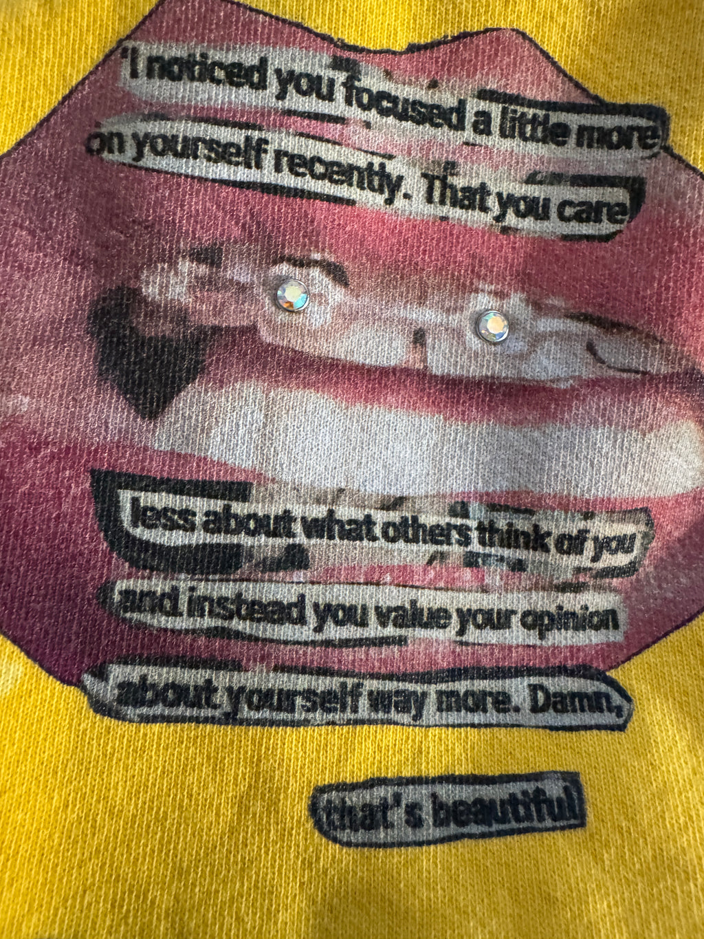 Close-up detail of the Sentimental Journey sweatshirt, showing rhinestone embellishment and hand stitching on the collar.