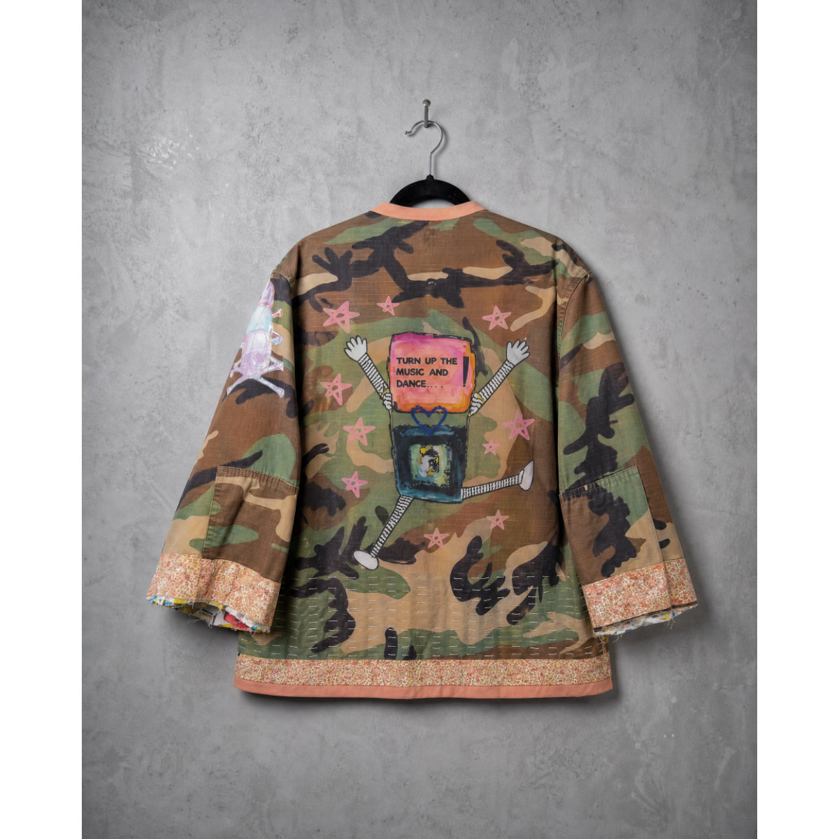 Music Head jacket, back view, laid flat, showing graphic sourced from the original painting.